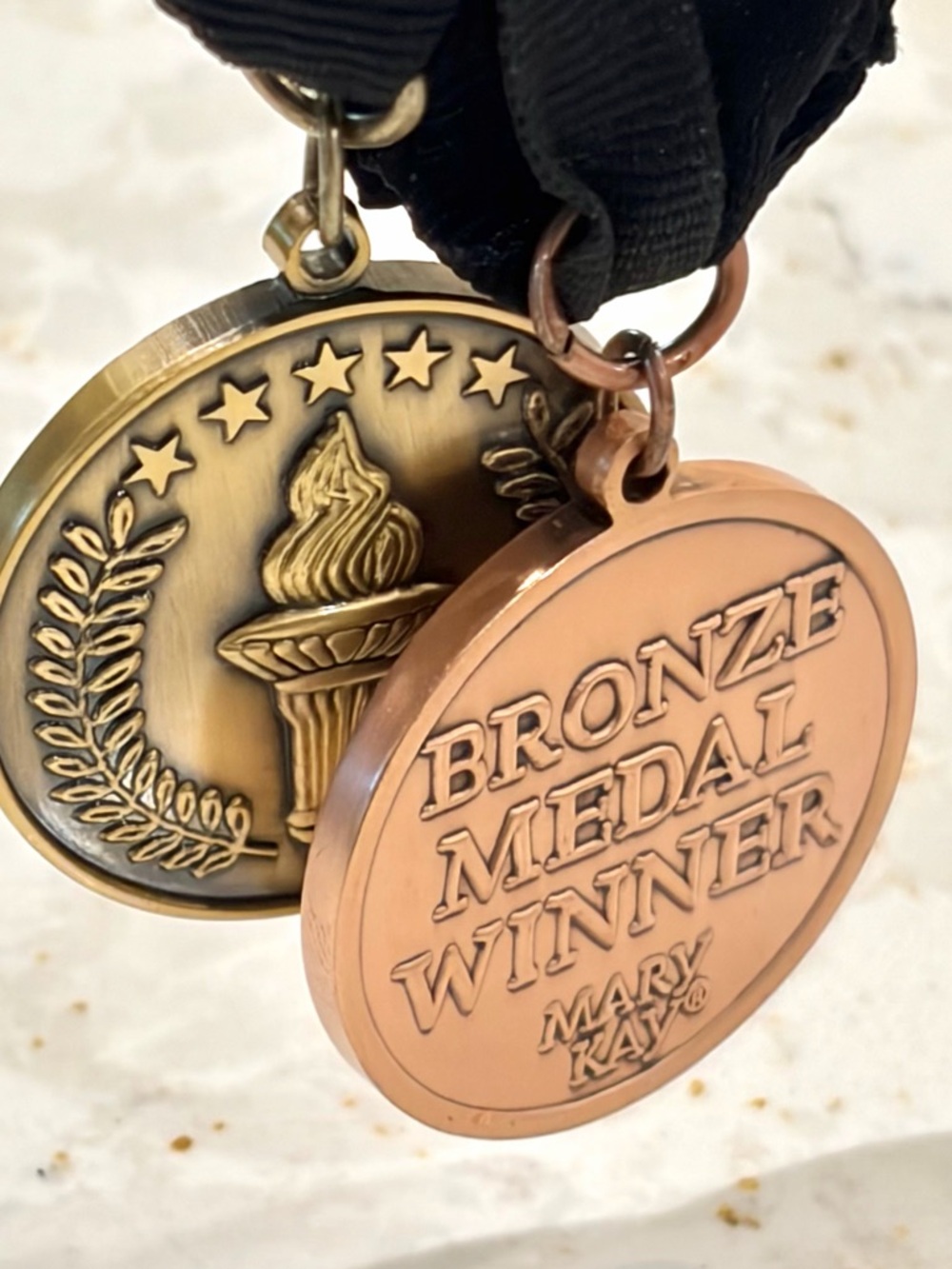 Mary Kay Gold and Bronze Medals